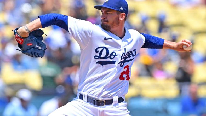 Jul 27, 2022; Los Angeles, California, USA; Los Angeles Dodgers starting pitcher Andrew Heaney (28) throws to the plate in the first inning against the Washington Nationals at Dodger Stadium. Mandatory Credit: Jayne Kamin-Oncea-USA TODAY Sports