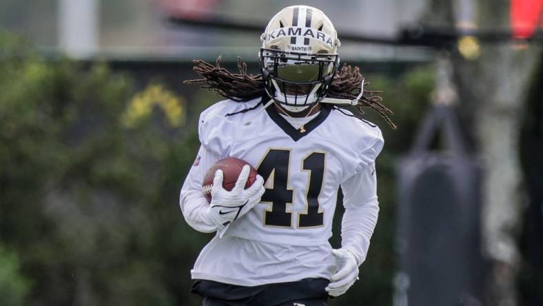 Jul 28, 2022; Metairie, LA, USA; New Orleans Saints running back Alvin Kamara (41) runs during training camp at Ochsner Sports Performance Center. Mandatory Credit: Stephen Lew-USA TODAY Sports