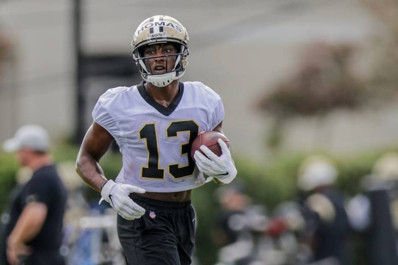 Jul 28, 2022; Metairie, LA, USA;  New Orleans Saints wide receiver Michael Thomas (13) runs during training camp at Ochsner Sports Performance Center. Mandatory Credit: Stephen Lew-USA TODAY Sports