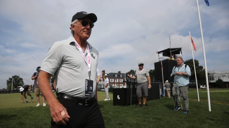 July 28, 2022; Bedminster, NJ, USA; Greg Norman heads to the first tee from putting practice to start the LIV Pro Am Tournament at Trump National in Bedminster, NJ on July 28, 2022. at Trump National in Bedminster, NJ on July 28, 2022. Mandatory Credit: Chris Pedota-USA TODAY NETWORK