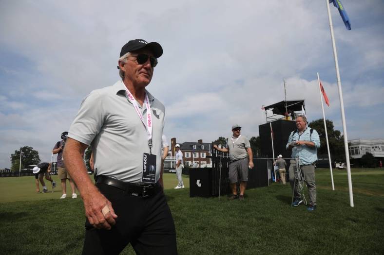 July 28, 2022; Bedminster, NJ, USA; Greg Norman heads to the first tee from putting practice to start the LIV Pro Am Tournament at Trump National in Bedminster, NJ on July 28, 2022. at Trump National in Bedminster, NJ on July 28, 2022. Mandatory Credit: Chris Pedota-USA TODAY NETWORK