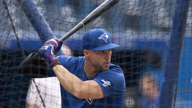 Jul 28, 2022; Toronto, Ontario, CAN; Toronto Blue Jays center fielder George Springer (4) takes batting practice before a game against the Detroit Tigers at Rogers Centre. Mandatory Credit: Nick Turchiaro-USA TODAY Sports