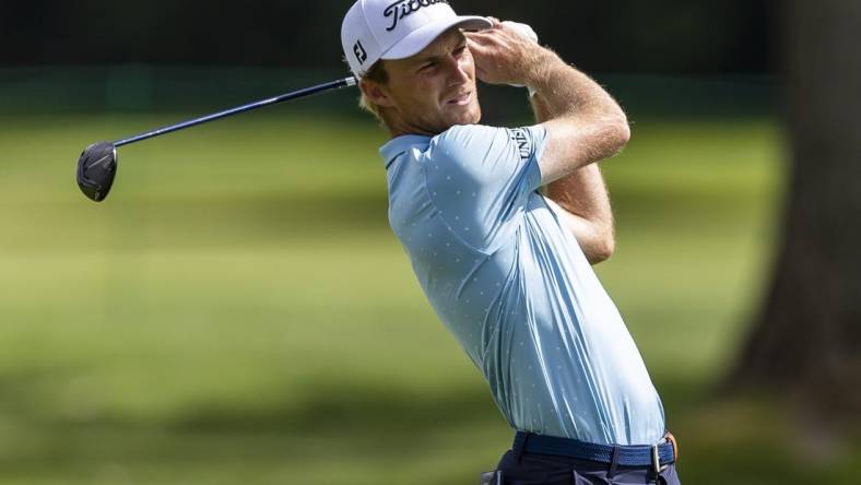 Jul 28, 2022; Detroit, Michigan, USA; Will Zalatoris hits his second shot on the par 5 fourteenth hole during the first round of the Rocket Mortgage Classic golf tournament. Mandatory Credit: Raj Mehta-USA TODAY Sports