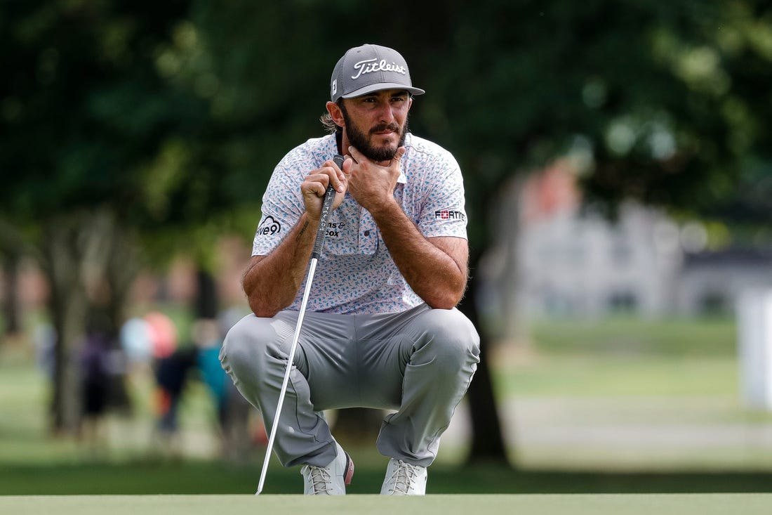 Max Homa aims for the 13th hole during Round 1 of the Rocket Mortgage Classic at the Detroit Golf Club in Detroit on Thursday, July 28, 2022.