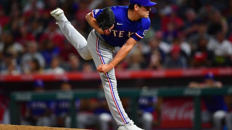 Jul 28, 2022; Anaheim, California, USA; Texas Rangers relief pitcher Matt Moore (45) throws against the Los Angeles Angels during the ninth inning at Angel Stadium. Mandatory Credit: Gary A. Vasquez-USA TODAY Sports