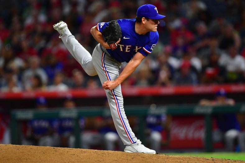 Jul 28, 2022; Anaheim, California, USA; Texas Rangers relief pitcher Matt Moore (45) throws against the Los Angeles Angels during the ninth inning at Angel Stadium. Mandatory Credit: Gary A. Vasquez-USA TODAY Sports