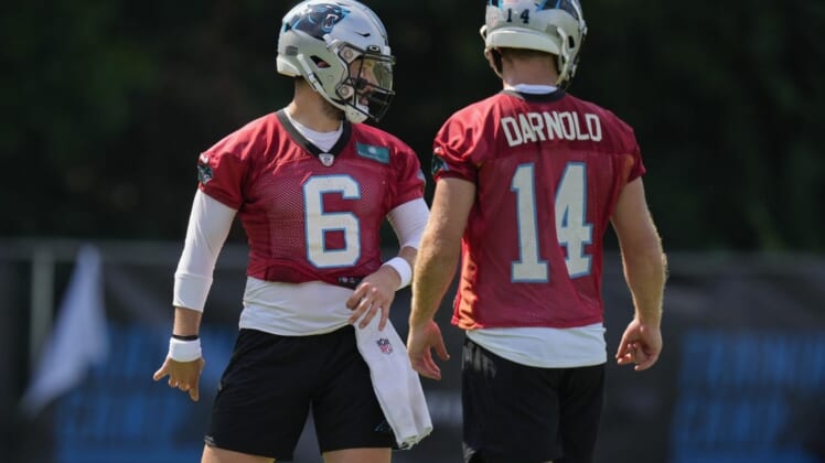 Jul 28, 2022; Spartanburg, SC, USA; Carolina Panthers quarterback Baker Mayfield (6) and quarterback Sam Darnold (14) during the third day of training camp at Wofford College. Mandatory Credit: Jim Dedmon-USA TODAY Sports