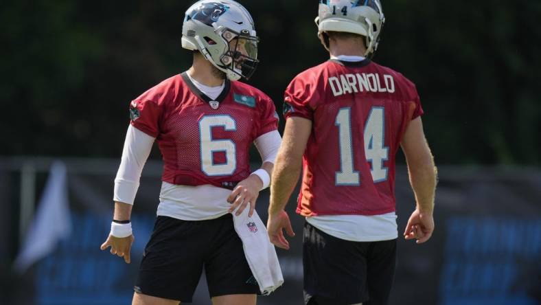 Jul 28, 2022; Spartanburg, SC, USA; Carolina Panthers quarterback Baker Mayfield (6) and quarterback Sam Darnold (14) during the third day of training camp at Wofford College. Mandatory Credit: Jim Dedmon-USA TODAY Sports