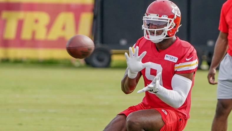 Jul 27, 2022; St. Joseph, MO, USA; Kansas City Chiefs wide receiver Juju Smith-Schuster (9) catches a pass during training camp at Missouri Western University.  Mandatory Credit: Denny Medley-USA TODAY Sports