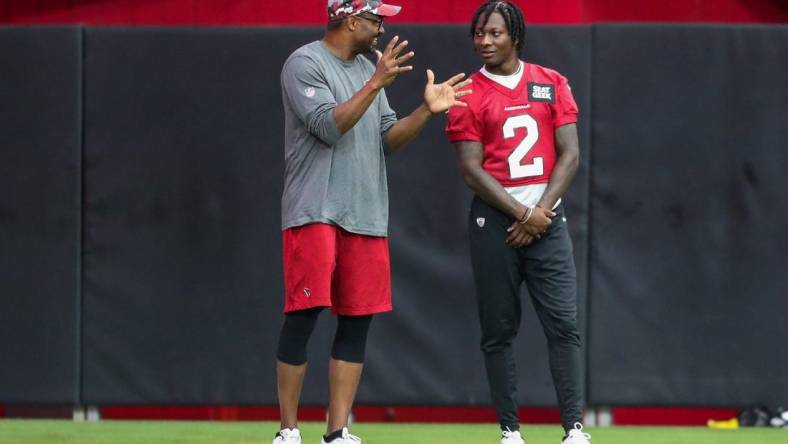 Arizona Cardinals quarterback Marquise Brown (2) speaks with a Cardinal staff member during Arizona Cardinals practice at State Farm Stadium on Friday, July 29, 2022, in Glendale.

Aj3i1031