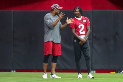 Arizona Cardinals quarterback Marquise Brown (2) speaks with a Cardinal staff member during Arizona Cardinals practice at State Farm Stadium on Friday, July 29, 2022, in Glendale.

Aj3i1031