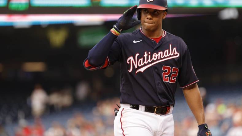 Jul 29, 2022; Washington, District of Columbia, USA; Washington Nationals right fielder Juan Soto (22) gestures to the St. Louis Cardinals dugout prior to his at-bat during the first inning at Nationals Park. Mandatory Credit: Geoff Burke-USA TODAY Sports