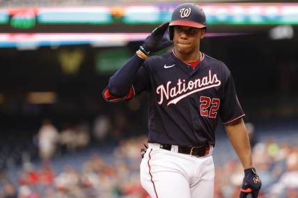 Jul 29, 2022; Washington, District of Columbia, USA; Washington Nationals right fielder Juan Soto (22) gestures to the St. Louis Cardinals dugout prior to his at-bat during the first inning at Nationals Park. Mandatory Credit: Geoff Burke-USA TODAY Sports