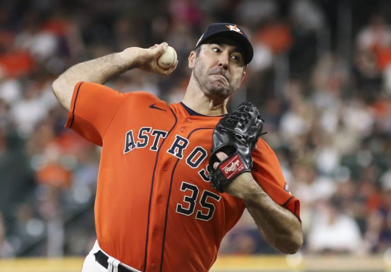 Jul 29, 2022; Houston, Texas, USA; Houston Astros starting pitcher Justin Verlander (35) pitches against the Seattle Mariners in the second inning at Minute Maid Park. Mandatory Credit: Thomas Shea-USA TODAY Sports