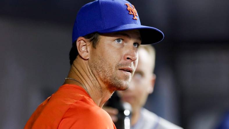 Jul 29, 2022; Miami, Florida, USA; New York Mets starting pitcher Jacob deGrom (48) watches from inside the dugout during the game against the Miami Marlins at loanDepot Park. Mandatory Credit: Sam Navarro-USA TODAY Sports