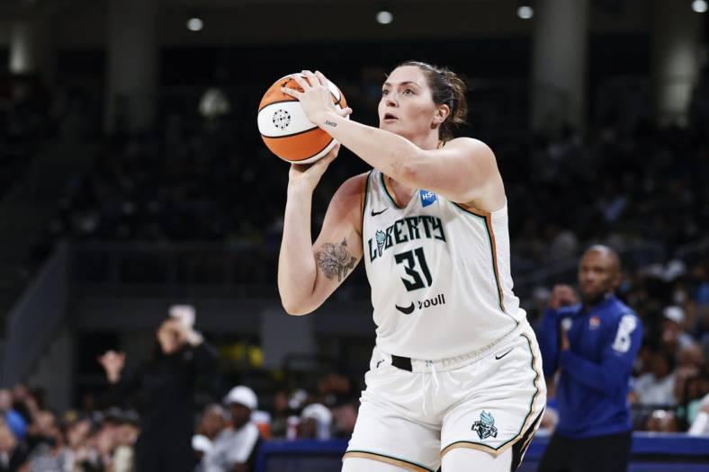 Jul 29, 2022; Chicago, Illinois, USA; New York Liberty center Stefanie Dolson (31) shoots against the Chicago Sky during the second half of the WNBA game at Wintrust Arena. Mandatory Credit: Kamil Krzaczynski-USA TODAY Sports