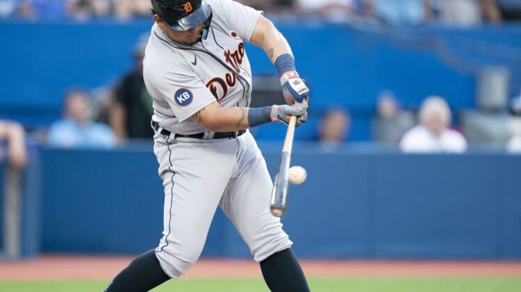 Jul 28, 2022; Toronto, Ontario, CAN; Detroit Tigers designated hitter Miguel Cabrera (24) hits a ball against the Toronto Blue Jays during the first inning at Rogers Centre. Mandatory Credit: Nick Turchiaro-USA TODAY Sports