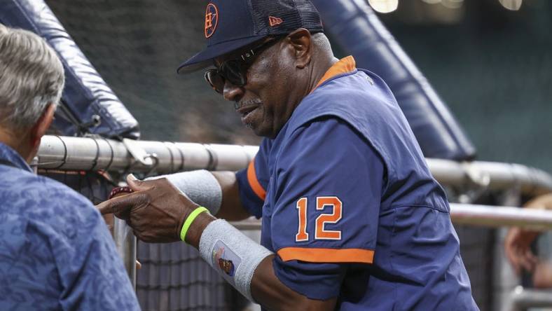 Jul 30, 2022; Houston, Texas, USA; Houston Astros manager Dusty Baker Jr. (12) talks before the game against the Seattle Mariners at Minute Maid Park. Mandatory Credit: Troy Taormina-USA TODAY Sports