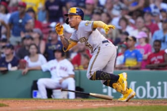 Jul 30, 2022; Boston, Massachusetts, USA; Milwaukee Brewers second baseman Kolten Wong (16) runs out a double against the Boston Red Sox during the ninth inning at Fenway Park. Mandatory Credit: Gregory Fisher-USA TODAY Sports