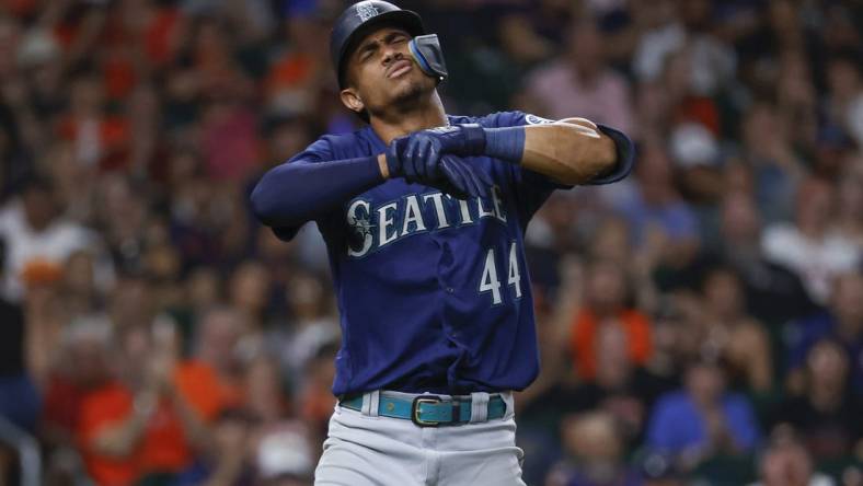 Jul 30, 2022; Houston, Texas, USA; Seattle Mariners center fielder Julio Rodriguez (44) reacts after an apparent injury during the eighth inning against the Houston Astros at Minute Maid Park. Mandatory Credit: Troy Taormina-USA TODAY Sports