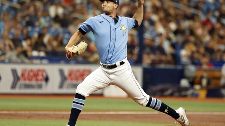 Jul 31, 2022; St. Petersburg, Florida, USA;  Tampa Bay Rays starting pitcher Shane McClanahan (18) throws a pitch against the Cleveland Guardians during the second inning at Tropicana Field. Mandatory Credit: Kim Klement-USA TODAY Sports