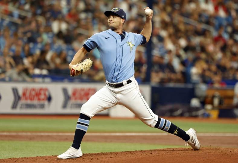 Jul 31, 2022; St. Petersburg, Florida, USA;  Tampa Bay Rays starting pitcher Shane McClanahan (18) throws a pitch against the Cleveland Guardians during the second inning at Tropicana Field. Mandatory Credit: Kim Klement-USA TODAY Sports