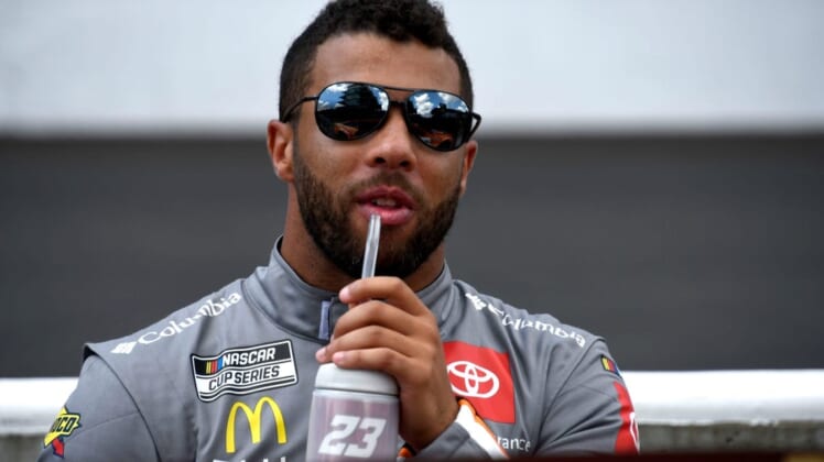 NASCAR Cup Series driver Bubba Wallace (23) sips on a drink Sunday, July 31, 2022, before the Verizon 200 at the Brickyard at Indianapolis Motor Speedway.