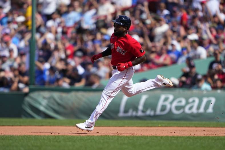 Jul 31, 2022; Boston, Massachusetts, USA; Boston Red Sox right fielder Jackie Bradley Jr. (19) runs out an RBI double against the Milwaukee Brewers during the sixth inning at Fenway Park. Mandatory Credit: Gregory Fisher-USA TODAY Sports
