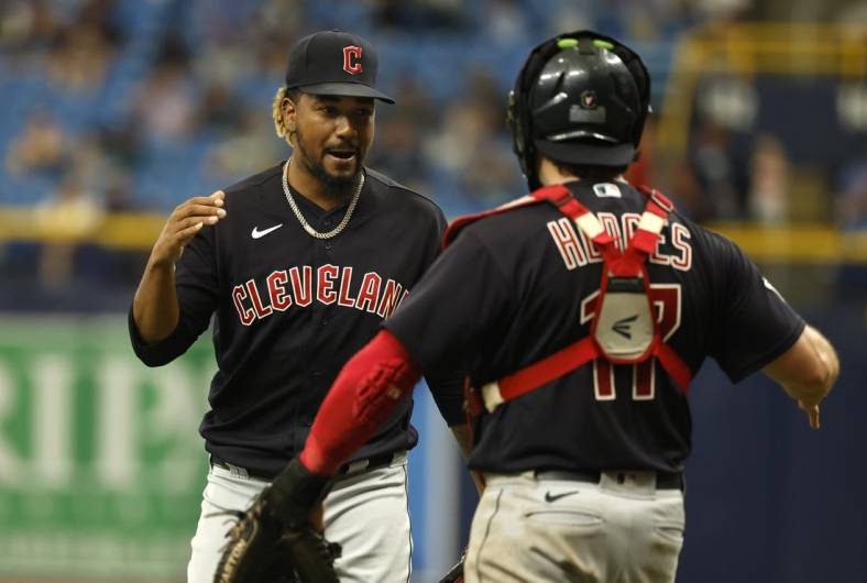 Jul 31, 2022; St. Petersburg, Florida, USA; Cleveland Guardians relief pitcher Emmanuel Clase (48) and catcher Austin Hedges (17) celebrate as they beat the Tampa Bay Rays at Tropicana Field. Mandatory Credit: Kim Klement-USA TODAY Sports
