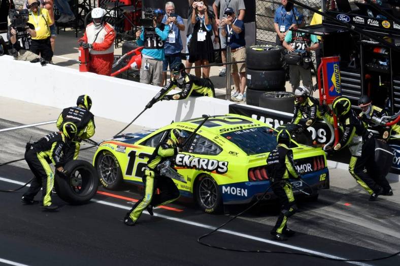 NASCAR Cup Series driver Ryan Blaney (12) makes a pit stop Sunday, July 31, 2022, during the Verizon 200 at the Brickyard at Indianapolis Motor Speedway.