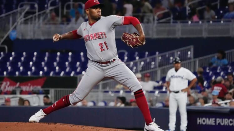 Aug 1, 2022; Miami, Florida, USA; Cincinnati Reds starting pitcher Hunter Greene (21) delivers a pitch in the first inning against the Miami Marlins at loanDepot park. Mandatory Credit: Jasen Vinlove-USA TODAY Sports