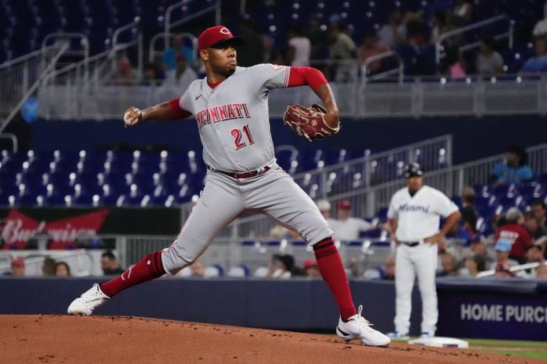 Aug 1, 2022; Miami, Florida, USA; Cincinnati Reds starting pitcher Hunter Greene (21) delivers a pitch in the first inning against the Miami Marlins at loanDepot park. Mandatory Credit: Jasen Vinlove-USA TODAY Sports