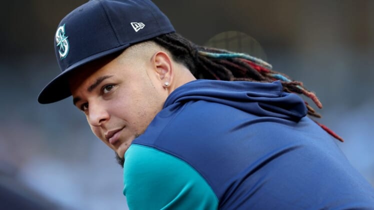 Aug 1, 2022; Bronx, New York, USA; Seattle Mariners starting pitcher Luis Castillo (21) in the dugout during the first inning against the New York Yankees at Yankee Stadium. Mandatory Credit: Brad Penner-USA TODAY Sports