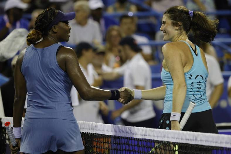Aug 1, 2022; Washington, DC, USA; Venus Williams (USA) (L) shakes hands with Rebecca Marino (CAN) (R) after their match on day one of the Citi Open at Rock Creek Park Tennis Center. Mandatory Credit: Geoff Burke-USA TODAY Sports