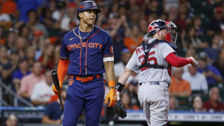 Aug 1, 2022; Houston, Texas, USA; Houston Astros shortstop Jeremy Pena (3) reacts after striking out during the eighth inning against the Boston Red Sox at Minute Maid Park. Mandatory Credit: Troy Taormina-USA TODAY Sports
