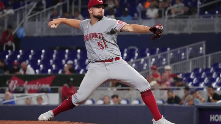 Aug 2, 2022; Miami, Florida, USA; Cincinnati Reds starting pitcher Graham Ashcraft (51) delivers a pitch in the first inning against the Miami Marlins at loanDepot park. Mandatory Credit: Jasen Vinlove-USA TODAY Sports