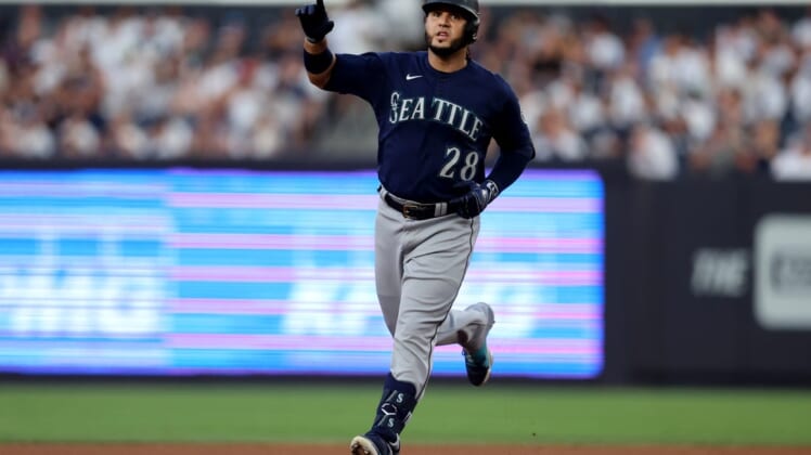 Aug 2, 2022; Bronx, New York, USA; Seattle Mariners third baseman Eugenio Suarez (28) rounds the bases after hitting a two run home run against the New York Yankees during the first inning at Yankee Stadium. Mandatory Credit: Brad Penner-USA TODAY Sports