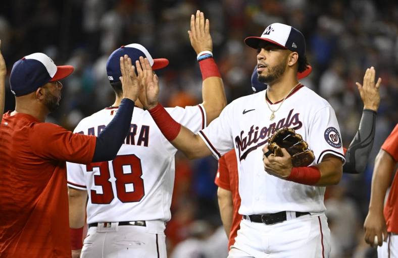 Aug 2, 2022; Washington, District of Columbia, USA; Washington Nationals shortstop Luis Garcia (2) celebrates after the game against the New York Mets at Nationals Park. Mandatory Credit: Brad Mills-USA TODAY Sports