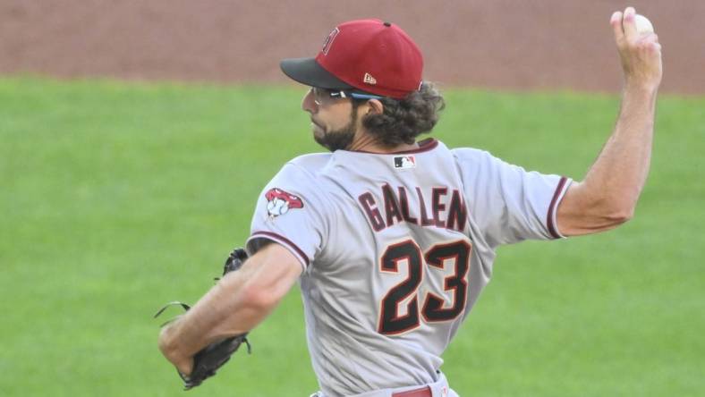 Aug 2, 2022; Cleveland, Ohio, USA; Arizona Diamondbacks starting pitcher Zac Gallen (23) delivers a pitch in the second inning against the Cleveland Guardians at Progressive Field. Mandatory Credit: David Richard-USA TODAY Sports