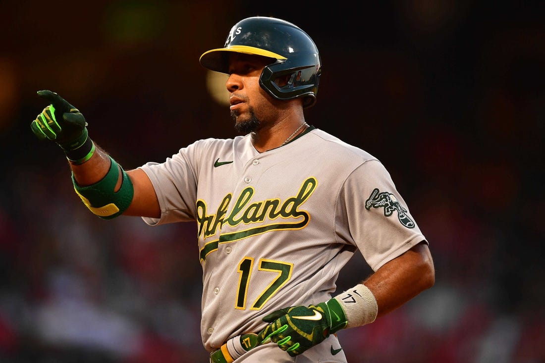 Aug 2, 2022; Anaheim, California, USA; Oakland Athletics shortstop Elvis Andrus (17) reacts after hitting a single against the Los Angeles Angels during the fourth inning at Angel Stadium. Mandatory Credit: Gary A. Vasquez-USA TODAY Sports