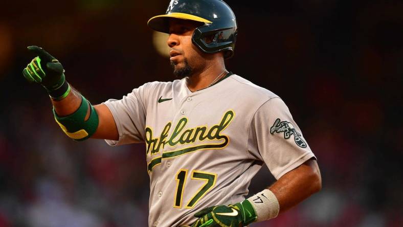 Aug 2, 2022; Anaheim, California, USA; Oakland Athletics shortstop Elvis Andrus (17) reacts after hitting a single against the Los Angeles Angels during the fourth inning at Angel Stadium. Mandatory Credit: Gary A. Vasquez-USA TODAY Sports