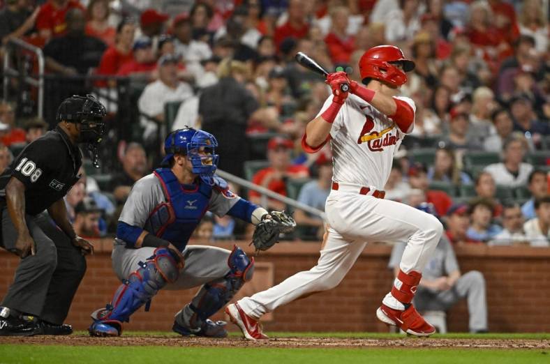 Aug 2, 2022; St. Louis, Missouri, USA;  St. Louis Cardinals right fielder Lars Nootbaar (21) hits a single against the Chicago Cubs during the fifth inning at Busch Stadium. Mandatory Credit: Jeff Curry-USA TODAY Sports
