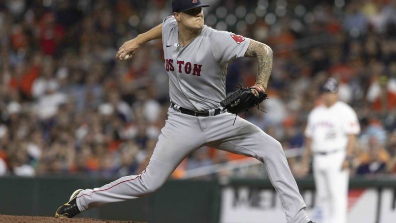 Aug 2, 2022; Houston, Texas, USA;  Boston Red Sox relief pitcher Tanner Houck (89) pitches against the Houston Astros in the eighth inning at Minute Maid Park. Mandatory Credit: Thomas Shea-USA TODAY Sports