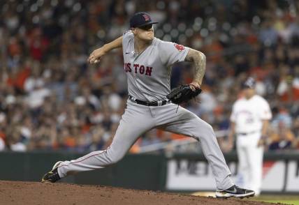 Aug 2, 2022; Houston, Texas, USA;  Boston Red Sox relief pitcher Tanner Houck (89) pitches against the Houston Astros in the eighth inning at Minute Maid Park. Mandatory Credit: Thomas Shea-USA TODAY Sports