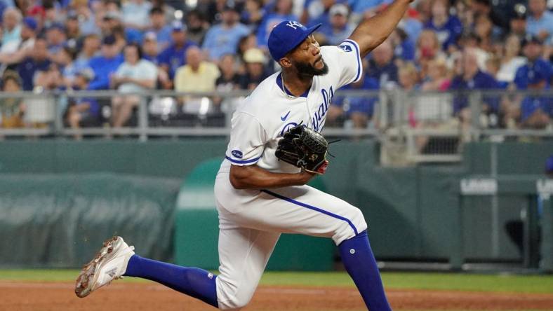 Jul 26, 2022; Kansas City, Missouri, USA; Kansas City Royals relief pitcher Amir Garrett (24) delivers a pitch against the Los Angeles Angels during the game at Kauffman Stadium. Mandatory Credit: Denny Medley-USA TODAY Sports