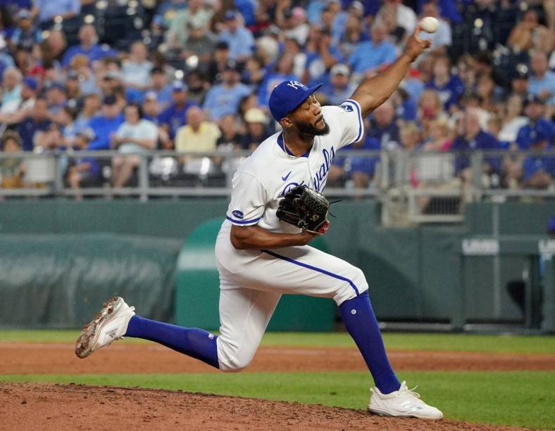 Jul 26, 2022; Kansas City, Missouri, USA; Kansas City Royals relief pitcher Amir Garrett (24) delivers a pitch against the Los Angeles Angels during the game at Kauffman Stadium. Mandatory Credit: Denny Medley-USA TODAY Sports