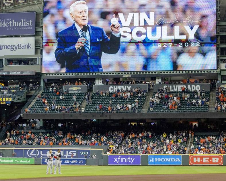 Aug 3, 2022; Houston, Texas, USA; Players and fans stand for a moment of silence for the passing of Vin Scully before the Houston Astros played against the Boston Red Sox at Minute Maid Park. Mandatory Credit: Thomas Shea-USA TODAY Sports