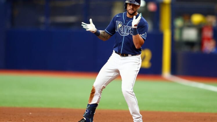 Aug 3, 2022; St. Petersburg, Florida, USA;  Tampa Bay Rays left fielder David Peralta (6) reacts after hitting an rbi single against the Toronto Blue Jays in the sixth inning at Tropicana Field. Mandatory Credit: Nathan Ray Seebeck-USA TODAY Sports