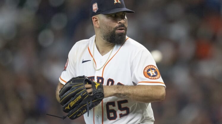 Aug 3, 2022; Houston, Texas, USA; Houston Astros starting pitcher Jose Urquidy (65) pitches against the Boston Red Sox in the fifth inning at Minute Maid Park. Mandatory Credit: Thomas Shea-USA TODAY Sports