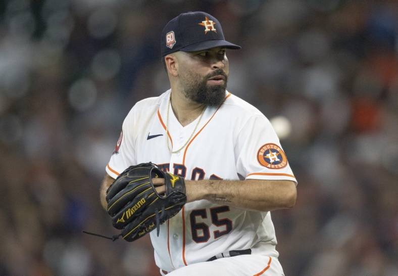 Aug 3, 2022; Houston, Texas, USA; Houston Astros starting pitcher Jose Urquidy (65) pitches against the Boston Red Sox in the fifth inning at Minute Maid Park. Mandatory Credit: Thomas Shea-USA TODAY Sports